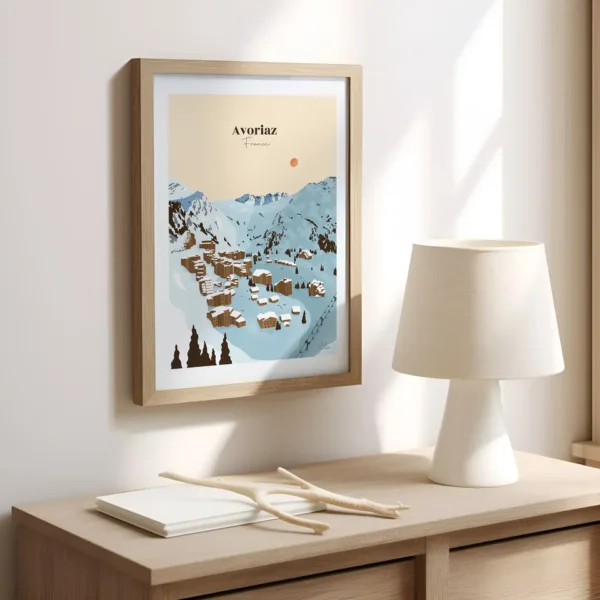 Une affiche sur un mur dans le bureau illustrant la station de ski et les chalets d'Avoriaz sous la neige