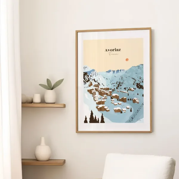 Une affiche dans le salon sur un mur illustrant la station de ski et les chalets d'Avoriaz sous la neige
