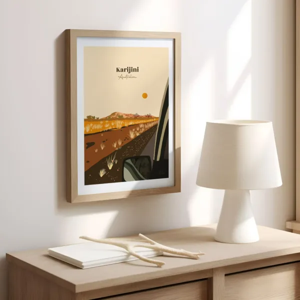 Une affiche sur un mur dans le bureau illustrant les plaines arides de sable rouge du Karijini National Park