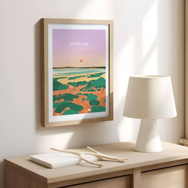 Une affiche sur un mur dans le bureau illustrant l'eau turquoise et de la plage de Shark Bay en Australie