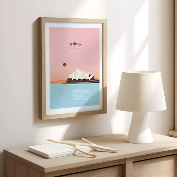 Une affiche sur un mur dans un bureau illustrant l'opéra et la baie de Sydney en Australie