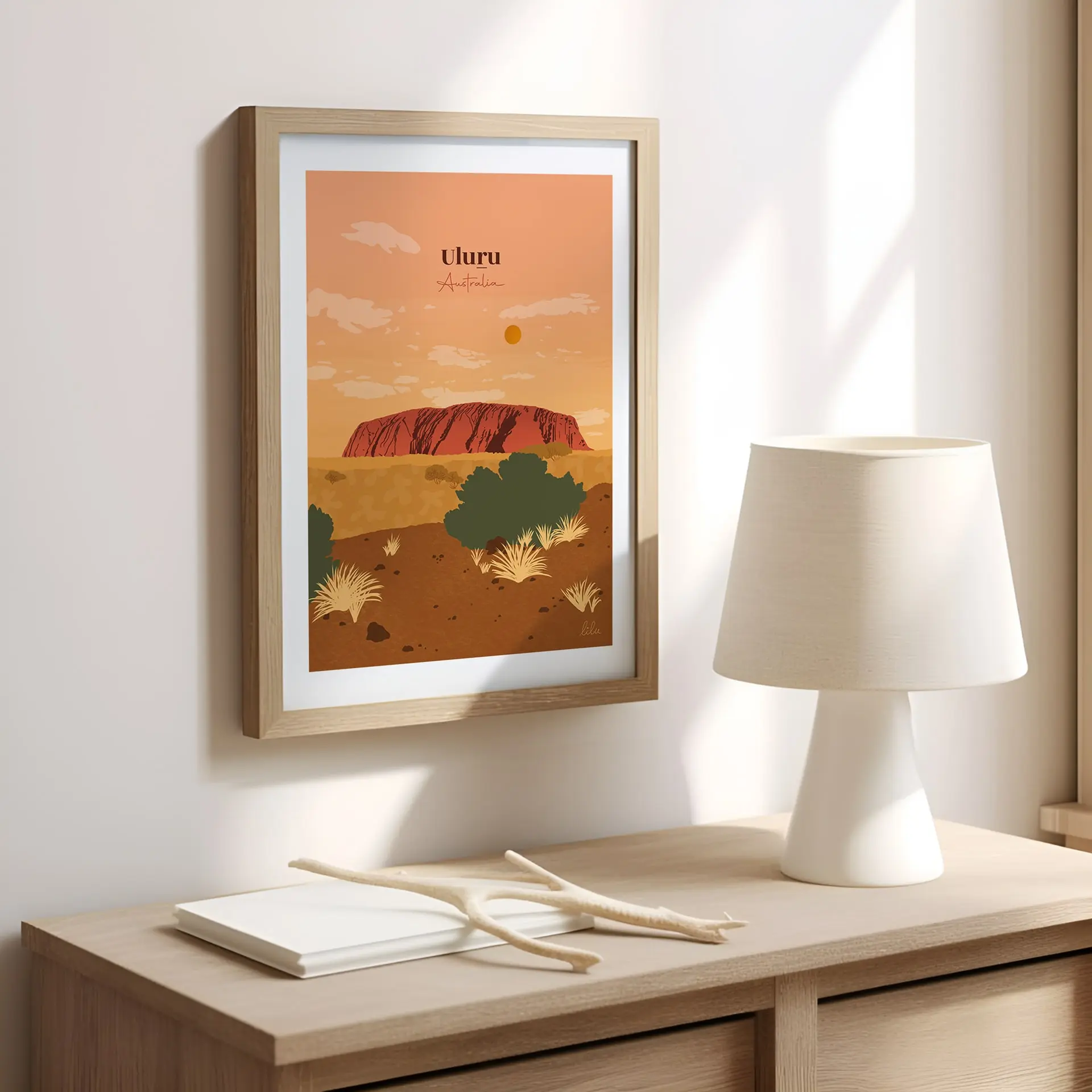poster-decoration-uluru-australie Une affiche sur un mur dans le bureau illustrant l'immense roger rouge d'Uluru au milieu du désert australien