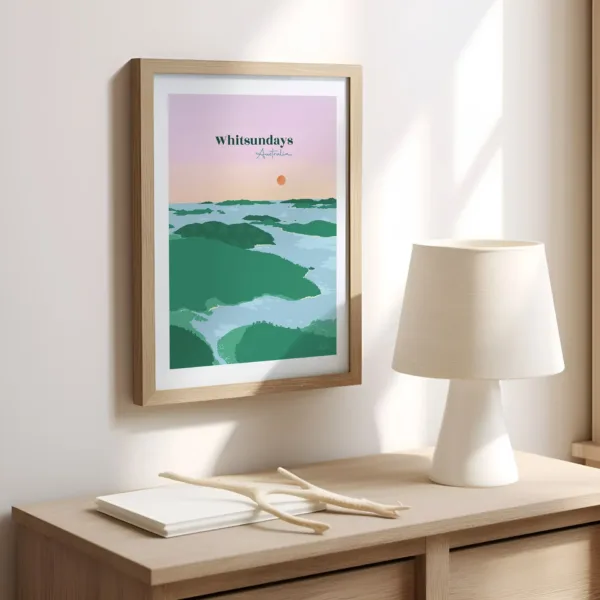 Une affiche sur un mur dans le bureau illustrant les îles et l'eau turquoise de l'archipel des Whitsundays