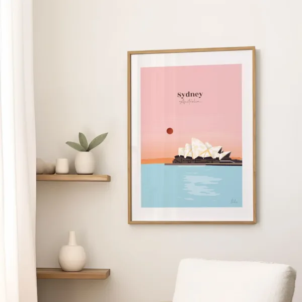 Une affiche sur un mur dans le salon illustrant l'opéra et la baie de Sydney en Australie