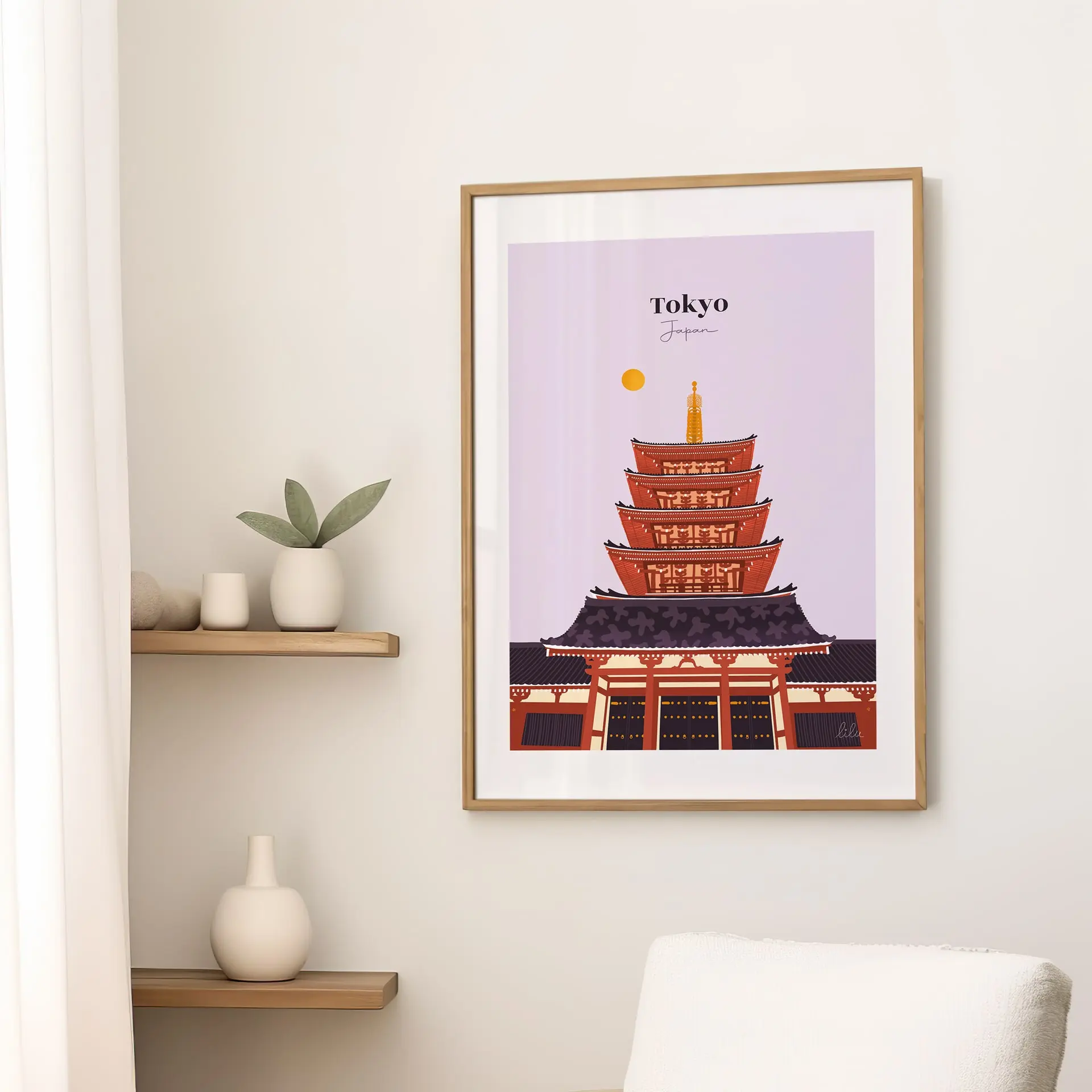 tableau-decoration-tokyo-japon Une affiche sur un mur dans le salon illustrant le sanctuaire d'Asakusa au Japon et sa pagode traditionnelle