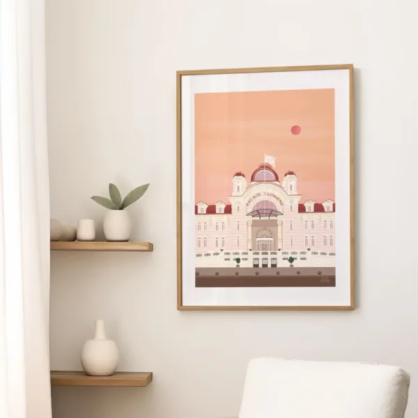 Une affiche sur un mur dans le salon illustrant le Palais Lumière à Evian les Bains